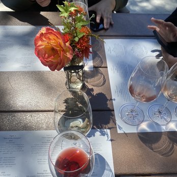 Lester Estate Wines - a group of people sitting at a table - Wineries Near Me - Aptos, California Lester Estate Wines - a group of people sitting at a table - Wineries Near Me - Aptos, California