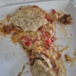 "Pizza" turns into slop when it's not even cut through and you are trying to eat in your car...very disappointed. "Pizza" turns into slop when it's not even cut through and you are trying to eat in your car...very disappointed.