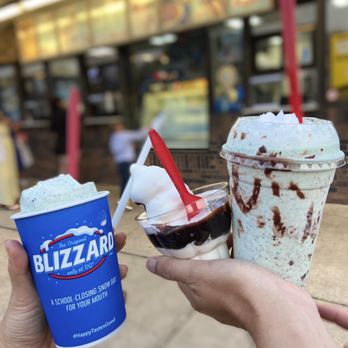 Dairy Queen Store - a hand holding a cup of blizzard milkshake - Ice Cream & Frozen Yogurt Near Me - Rochester, Minnesota Dairy Queen Store - a hand holding a cup of blizzard milkshake - Ice Cream & Frozen Yogurt Near Me - Rochester, Minnesota
