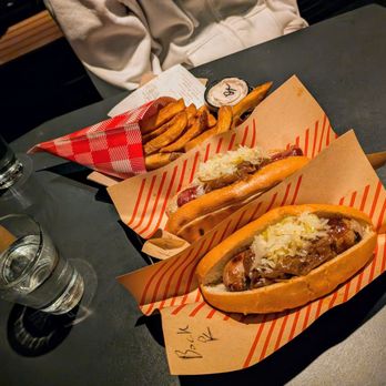 Wurstküche - Large fries on top, Kielbasa middle (tasty), and bockwurst bottom (clean) - Hot Dogs Near Me - Los Angeles, California Wurstküche - Large fries on top, Kielbasa middle (tasty), and bockwurst bottom (clean) - Hot Dogs Near Me - Los Angeles, California