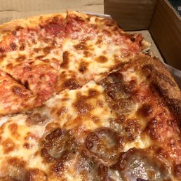 Cheese and one slice of that perfect sausage 'za left Cheese and one slice of that perfect sausage 'za left