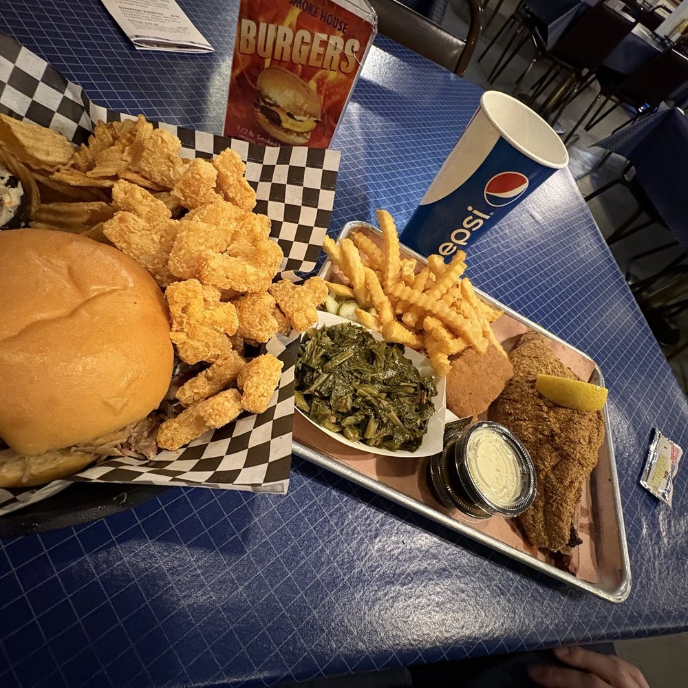 Pulled Pork Sandwich with tots, chip, and coleslaw. Fried Catfish with collards, krinkle fries, and cornbread