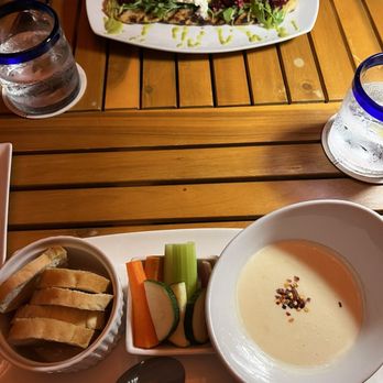 Oceana Restaurant & Bistro - Our appetizers - Burrata with beet flatbread, and pecorino fondue - Seafood Near Me - St. Thomas, Virgin Islands Oceana Restaurant & Bistro - Our appetizers - Burrata with beet flatbread, and pecorino fondue - Seafood Near Me - St. Thomas, Virgin Islands
