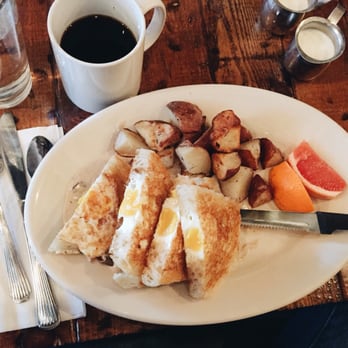 Americana - eggs in a basket with wild mushroom sauce (v) - New American Near Me - Seattle, Washington
