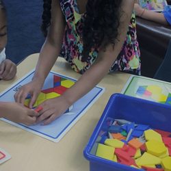 Joan Richards Learning Village - Sharing materials, helping a friend, math, geometry