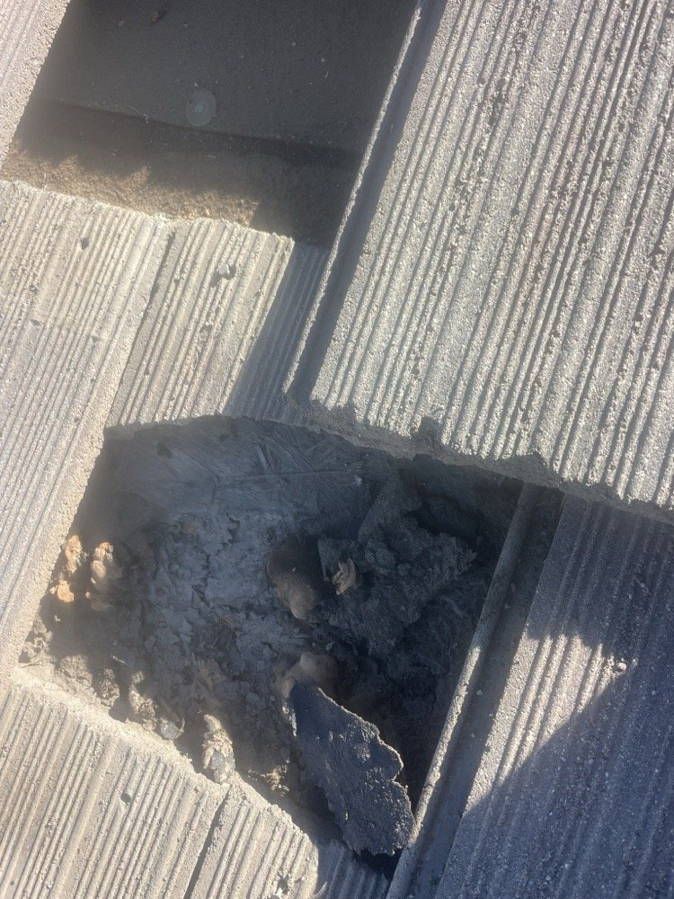 Slide of A Town Roofing