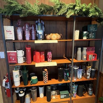 Starbucks - Merchandise shelf with pretty Pine Garland - Coffee & Tea Near Me - Waterford, Michigan
