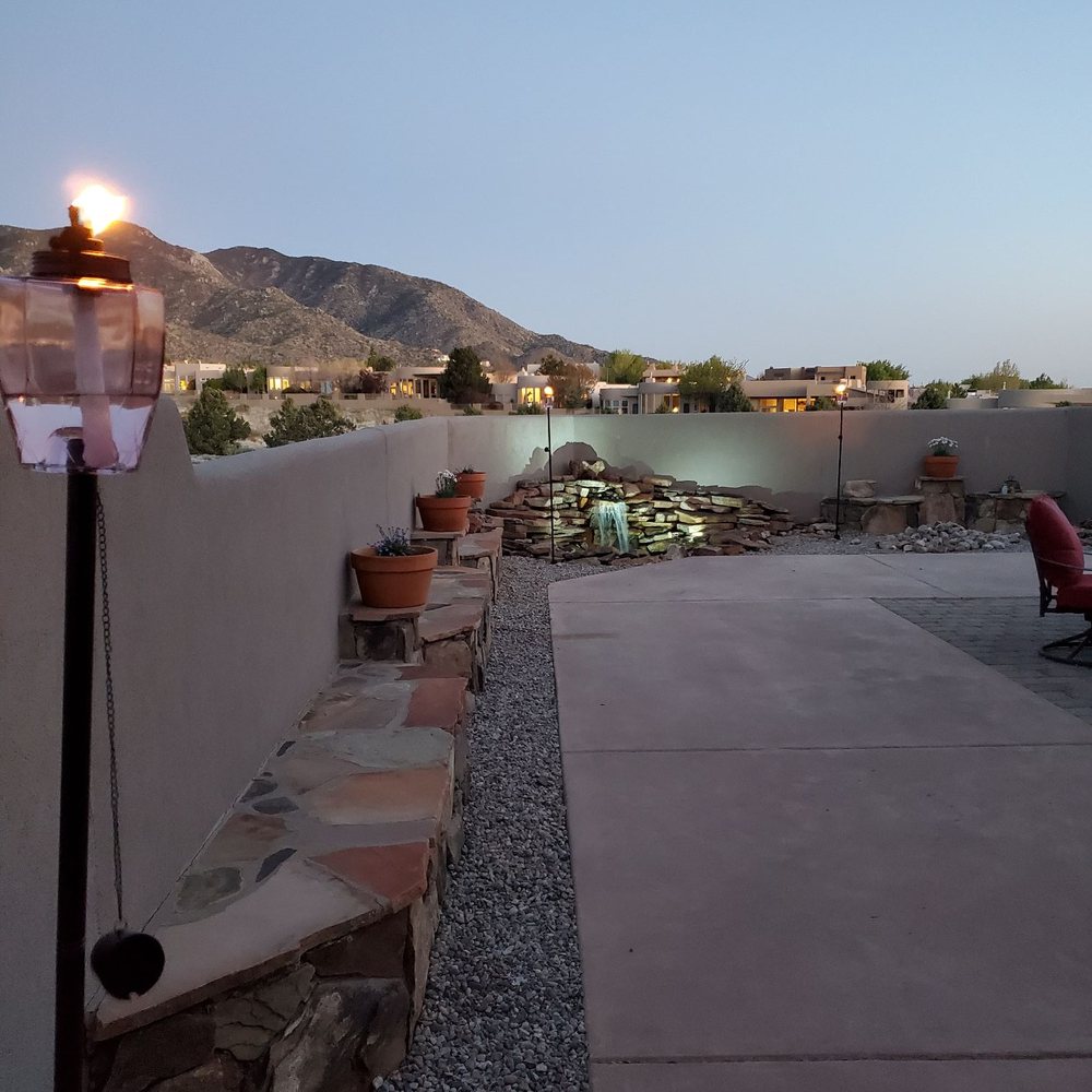 Roadrunner Yard Clean-up And Maintenance Services - Helped install the tiki torches to repel bugs - Lawn Services Near Me - Albuquerque, New Mexico