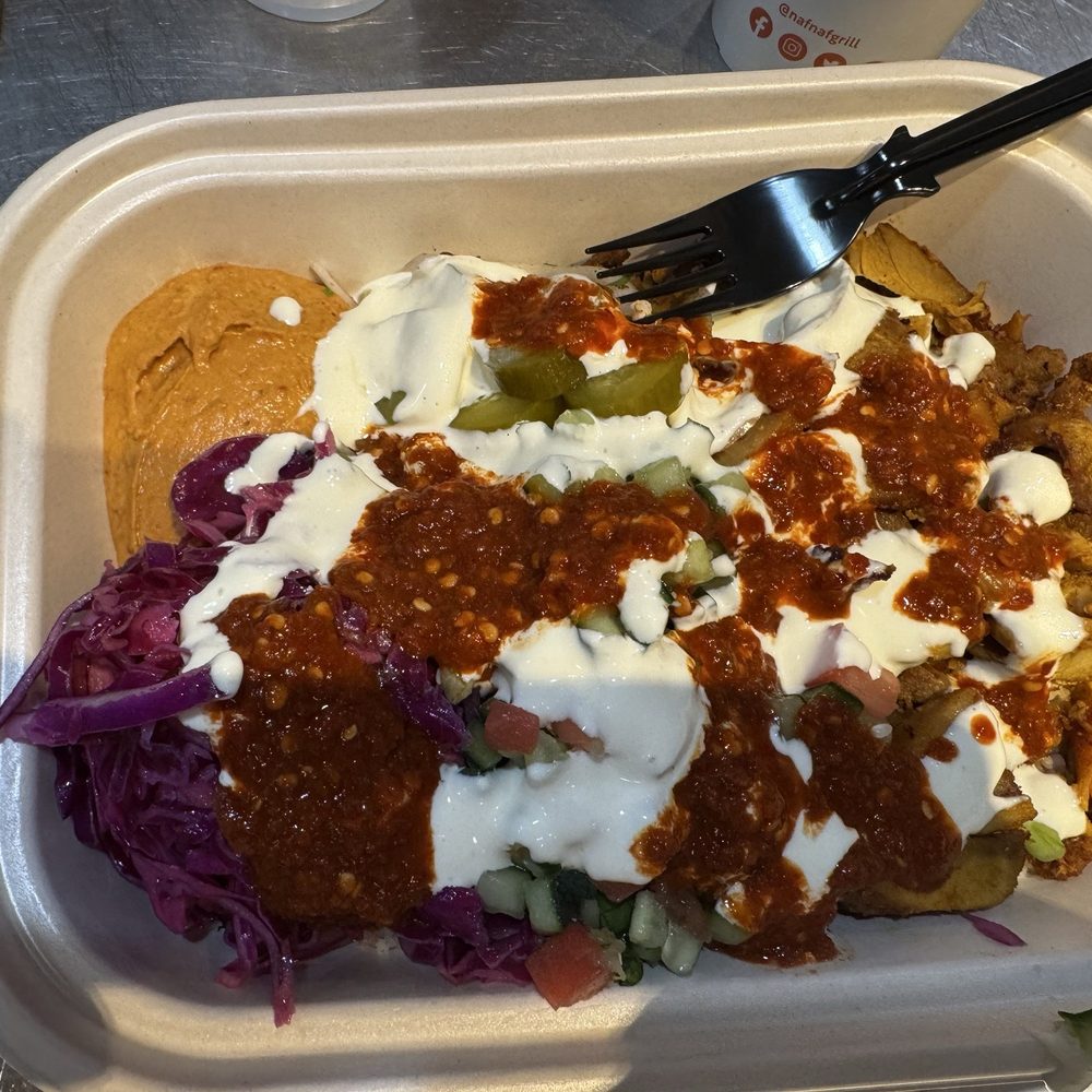 Naf Naf Grill - Chicken plate with veggies and spicy sauce. - Middle Eastern Near Me - Glenview, Illinois Naf Naf Grill - Chicken plate with veggies and spicy sauce. - Middle Eastern Near Me - Glenview, Illinois