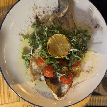 Basta - Grilled Whole Branzino Arugula Salad with Fennel, Lemon Olive Oil Vinaigrette, Blistered Tomatoes - Salad Near Me - Thousand Oaks, California Basta - Grilled Whole Branzino Arugula Salad with Fennel, Lemon Olive Oil Vinaigrette, Blistered Tomatoes - Salad Near Me - Thousand Oaks, California