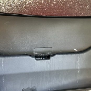 Vivid Tint & Audio - Rear window with dry liquid all over it from the sprays they use - Car Stereo Installation Near Me - Whittier, California