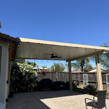 The Blind Butler - And yet another patio cover picture with the fan installed. - Shutters Near Me