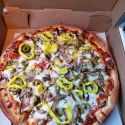 Don Brand's Pizza - This is a small, extra sauce, extra well done pizza with mushrooms, green olives and banana peppers.  I forgot to ask for 2x banana peppers!