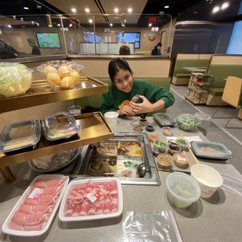 Haidilao Hotpot Flushing - The spread...count em 1,2,3,4...4 soup bases ina quad cauldron...from bomb to bangin' - Hot Pot Near Me - Flushing, New York