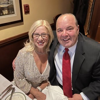 Arte Restaurant - a man and a woman sitting at a table - Italian Near Me - New York, New York