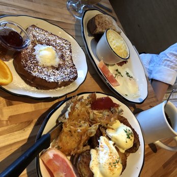 Hot Suppa - Eggs benedict, (hiding) corned beef hash with grits and eggs, and a french toast - Breakfast & Brunch Near Me - Portland, Maine Hot Suppa - Eggs benedict, (hiding) corned beef hash with grits and eggs, and a french toast - Breakfast & Brunch Near Me - Portland, Maine