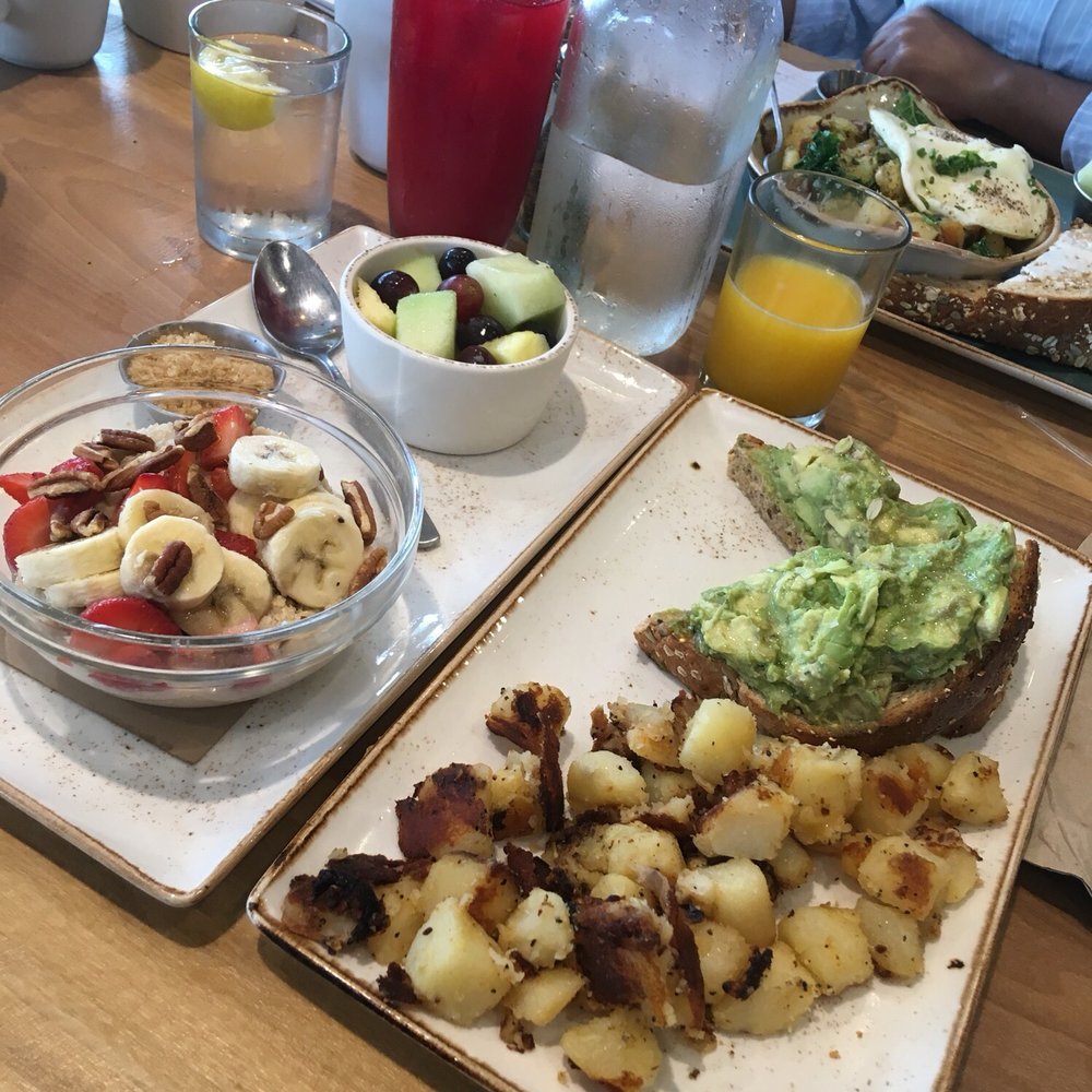 First Watch - Oatmeal with strawberry, banana and pecans and a fruit cup and the Avocado toast and potatoes( put some hotsauce on there real quick) - Breakfast & Brunch Near Me - Melbourne, Florida First Watch - Oatmeal with strawberry, banana and pecans and a fruit cup and the Avocado toast and potatoes( put some hotsauce on there real quick) - Breakfast & Brunch Near Me - Melbourne, Florida