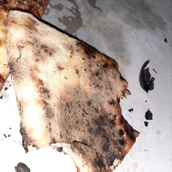 Area Four - Under side of pizza, completely burnt. very hard pieces. not really edible - Pizza Near Me - Cambridge, Massachusetts Area Four - Under side of pizza, completely burnt. very hard pieces. not really edible - Pizza Near Me - Cambridge, Massachusetts
