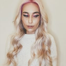 Rose Gold Toned Platinum Blonde With Pink Roots