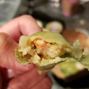 Momo Sushi - Interior of vegetable gyoza ($4.50). Tastes fine, but is mushy. - Japanese Near Me - Minneapolis, Minnesota Momo Sushi - Interior of vegetable gyoza ($4.50). Tastes fine, but is mushy. - Japanese Near Me - Minneapolis, Minnesota