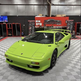 Exotic Fusion Auto - Green Lamborghini with ceramic coating service perform - Auto Detailing Near Me - Deerfield Beach, Florida Exotic Fusion Auto - Green Lamborghini with ceramic coating service perform - Auto Detailing Near Me - Deerfield Beach, Florida
