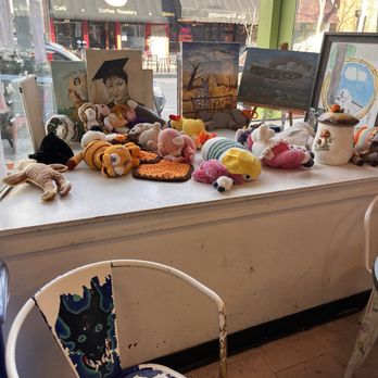 Sparky's Homemade Ice Cream - Seating and window crochet toy area - Ice Cream & Frozen Yogurt Near Me - Columbia, Missouri