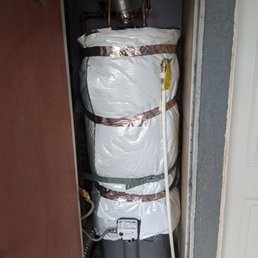 New water heater with thermal blanket