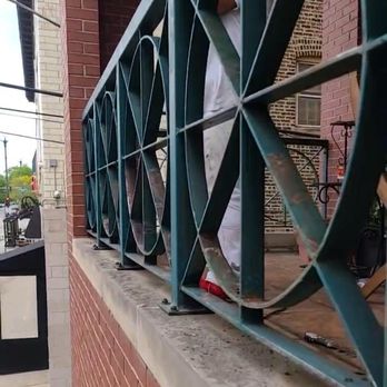 Golden Painters and Remodeling Corp - Before: Green, rusty balcony railings - Painters Near Me