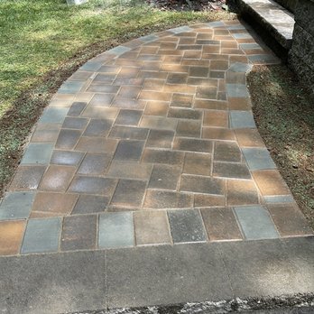 G Campos Landscaping - a man working on a walkway - Landscaping Near Me