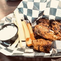 The Salty Dog Bar & Grill - Charbuff, extra crispy, extra dry ghost pepper wings with blue cheese