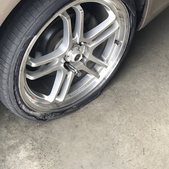 Skyline Automotive - Flat tire that this man refused to help me change. Even when I offered to pay and said I had a spare in my trunk. - Auto Repair Near Me - Gardena, California