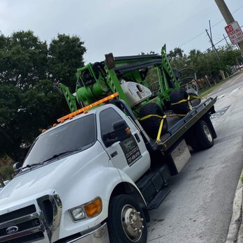 Breadwynners - a tow truck with a loader on the back - Towing Near Me Breadwynners - a tow truck with a loader on the back - Towing Near Me