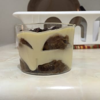 Felice 64 - Yep. Believe it or not THIS TINY LITTLE THING is their $9 tiramisu. Sad... - Wine Bars Near Me - New York, New York Felice 64 - Yep. Believe it or not THIS TINY LITTLE THING is their $9 tiramisu. Sad... - Wine Bars Near Me - New York, New York
