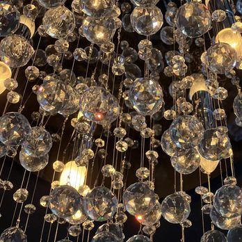 Le Ros - Pretty glass chandelier above our table - Thai Near Me - Marblehead, Massachusetts
