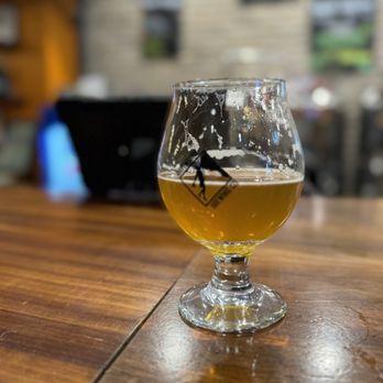 Adventure Brewing Company - a glass of beer on a table - Breweries Near Me - Fredericksburg, Virginia Adventure Brewing Company - a glass of beer on a table - Breweries Near Me - Fredericksburg, Virginia