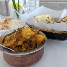 Vegetarian aloo gobhi mutter Garlic naan Vegetarian aloo gobhi mutter Garlic naan