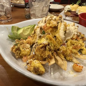Ruby Slipper Decatur - Migas with crawfish and cream sauce. - Breakfast & Brunch Near Me - New Orleans, Louisiana Ruby Slipper Decatur - Migas with crawfish and cream sauce. - Breakfast & Brunch Near Me - New Orleans, Louisiana
