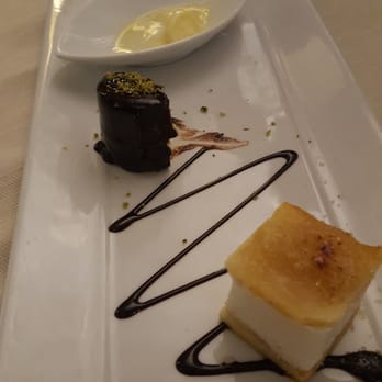 Ristorante DON Camillo - Amazing orange ice cream that was devoured before the picture was taken. - Italian Near Me - Siracusa, SR
