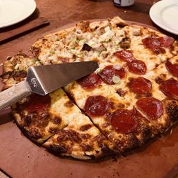 Half Phil's Honey Heat half Buffalo Bill's Pizza Half Phil's Honey Heat half Buffalo Bill's Pizza