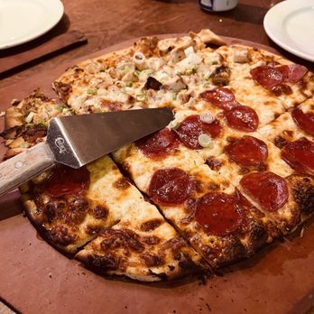 Flo & Santos - Half Phil's Honey Heat half Buffalo Bill's Pizza - Pizza Near Me - Chicago, Illinois Flo & Santos - Half Phil's Honey Heat half Buffalo Bill's Pizza - Pizza Near Me - Chicago, Illinois