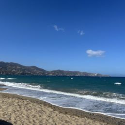 Beach in front of restaurant Beach in front of restaurant