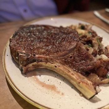 97 West Kitchen & Bar - Dry aged 18oz bone in rib eye - Cocktail Bars Near Me - Fort Worth, Texas 97 West Kitchen & Bar - Dry aged 18oz bone in rib eye - Cocktail Bars Near Me - Fort Worth, Texas