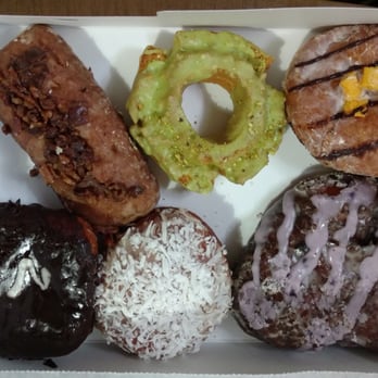 Stan's Donuts & Coffee - Maple caramel bacon pecan bar, Lemon pistachio, Captain crunch Bismark, Nutella pocket, Coconut cream, and Blueberry Fritter - Donuts Near Me - Chicago, Illinois Stan's Donuts & Coffee - Maple caramel bacon pecan bar, Lemon pistachio, Captain crunch Bismark, Nutella pocket, Coconut cream, and Blueberry Fritter - Donuts Near Me - Chicago, Illinois