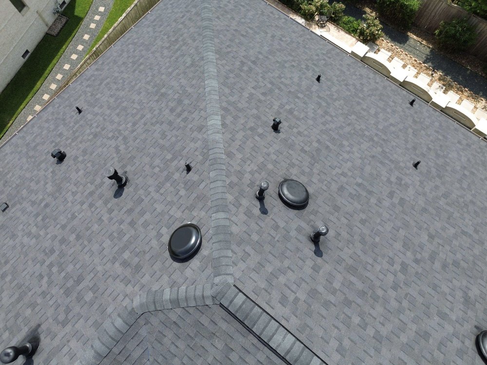 Slide of Noble Roofing