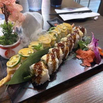 A Go Go Sushi and Ramen - SR36. Angry Bird Roll (left) and SR19. Alaskan Roll (right) - Sushi Bars Near Me - Round Rock, Texas A Go Go Sushi and Ramen - SR36. Angry Bird Roll (left) and SR19. Alaskan Roll (right) - Sushi Bars Near Me - Round Rock, Texas