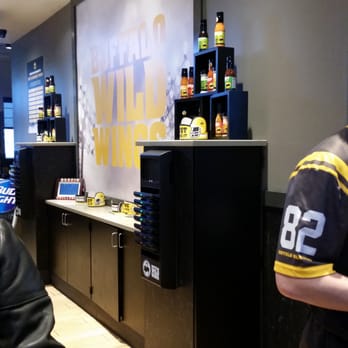 Buffalo Wild Wings - Tower of take home sauce - American Near Me - West Bend, Wisconsin Buffalo Wild Wings - Tower of take home sauce - American Near Me - West Bend, Wisconsin