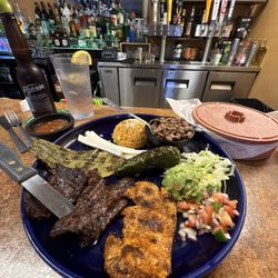 Mmm Que Rico - Grilled sirloin, chicken and nopales.