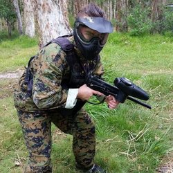Mango Hill Skirmish - Every one gets a Tippmann A5 with a response trigger. Every one gets overalls and a combat vest with ammo pouches. This person is black team