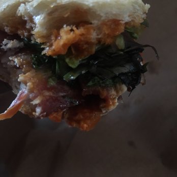 St Paul Cheese Shop - This is the Surprise! I believe they put on Chèvre, spicy sauce, greens, bacon and spicy red peppers - Cheese Shops Near Me - Saint Paul, Minnesota