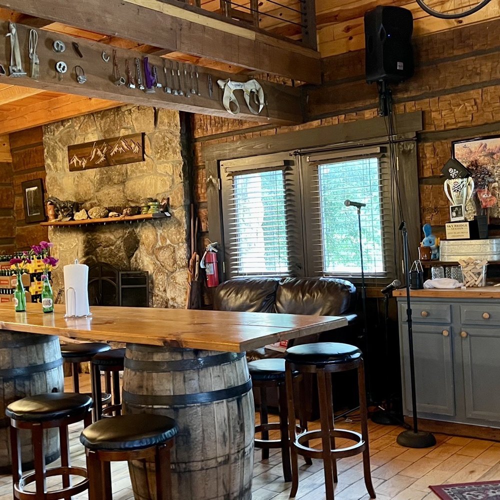 Sky Bridge Station - a bar with stools and a clock on the wall - Hot Dogs Near Me - Pine Ridge, Kentucky Sky Bridge Station - a bar with stools and a clock on the wall - Hot Dogs Near Me - Pine Ridge, Kentucky